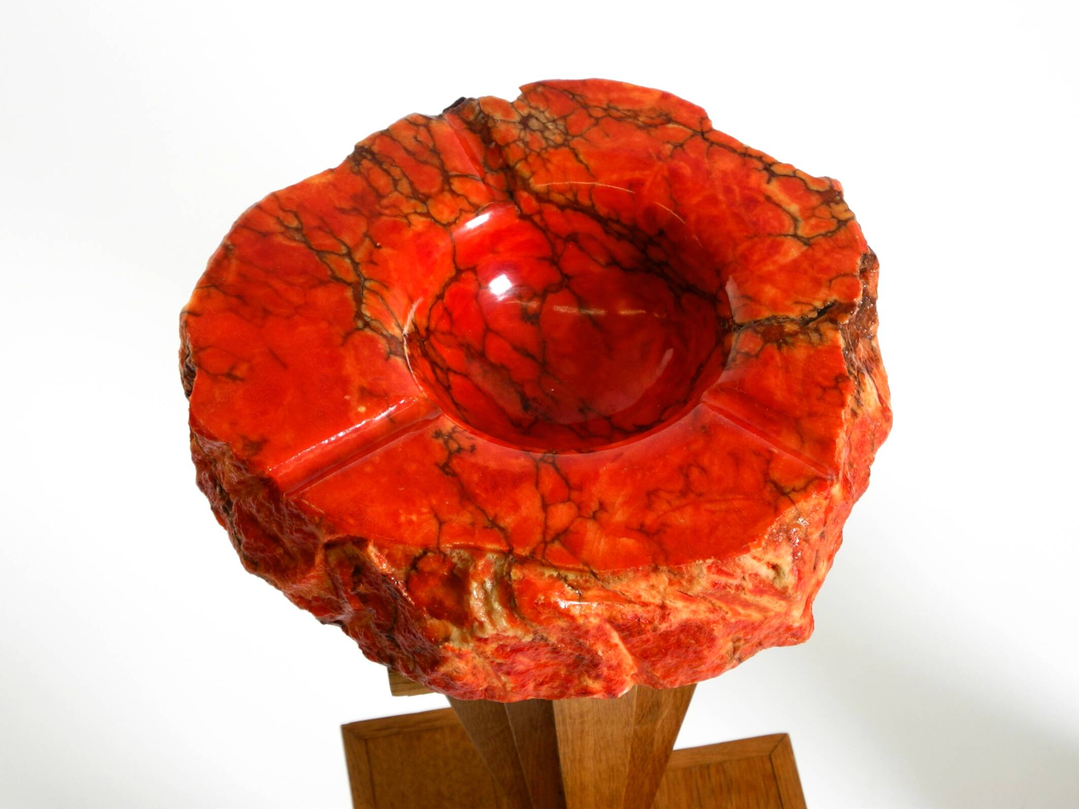 Two mid-century standing ashtrays consisting of red Alabaster cup