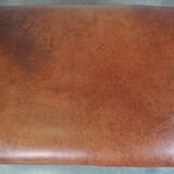 Leather ottoman in classic English style finished with decorative nails