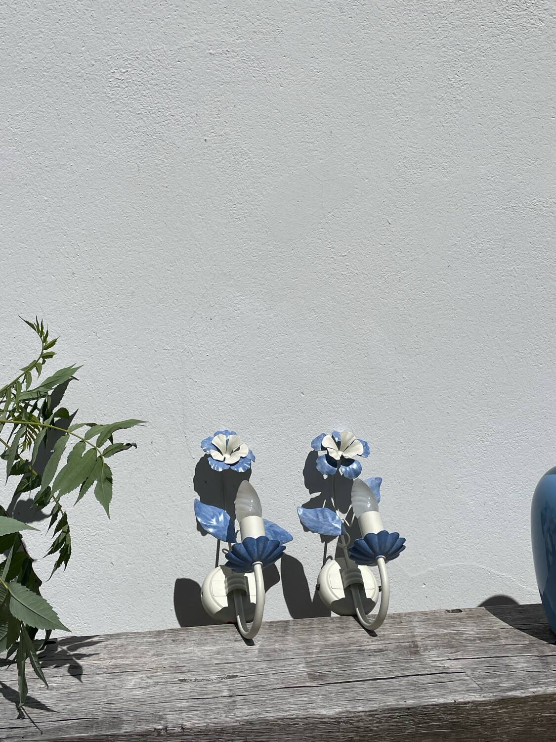 Pair of blue metal floral wall lights
