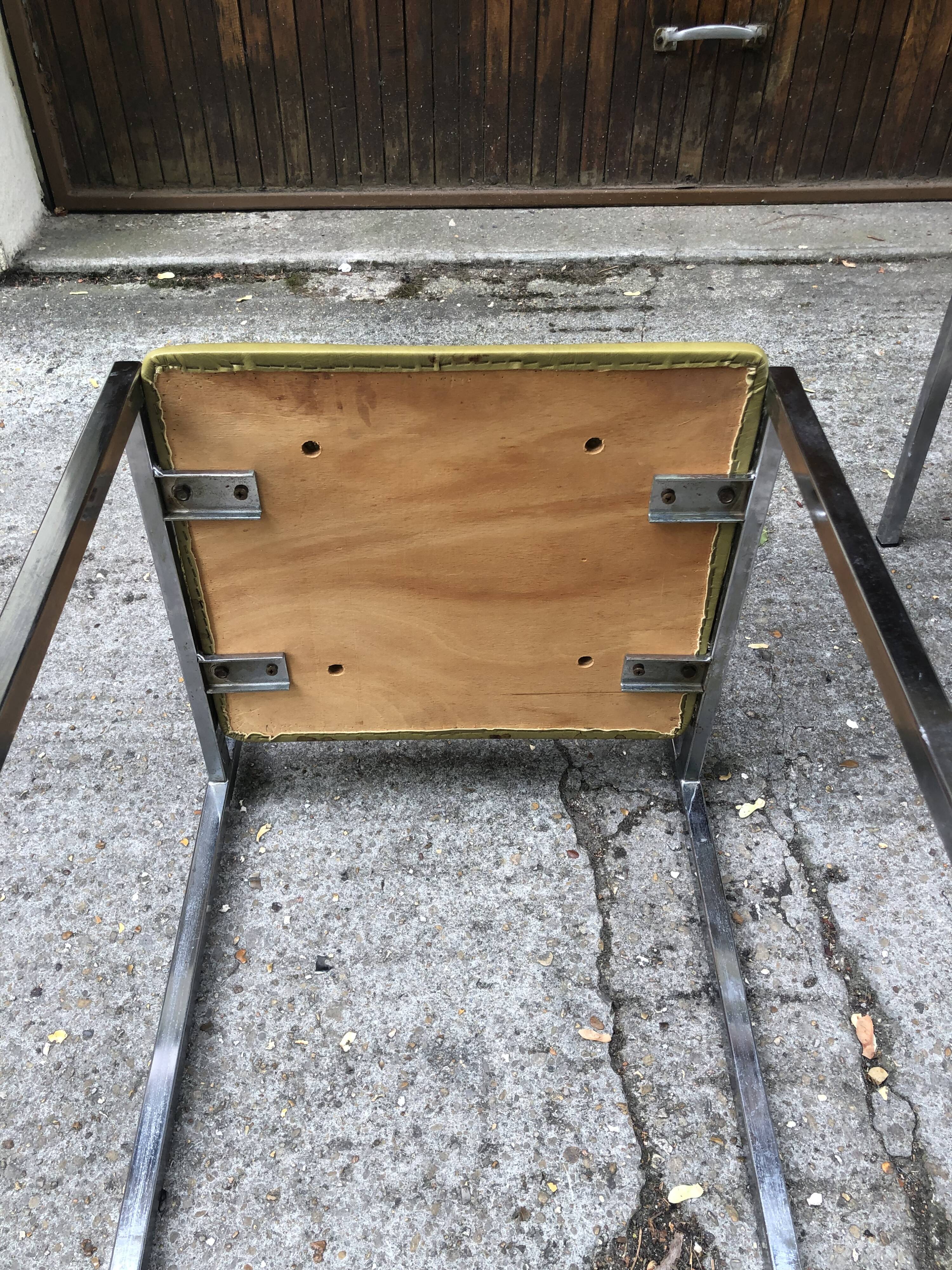 Series of 4 vintage chairs in Skaï