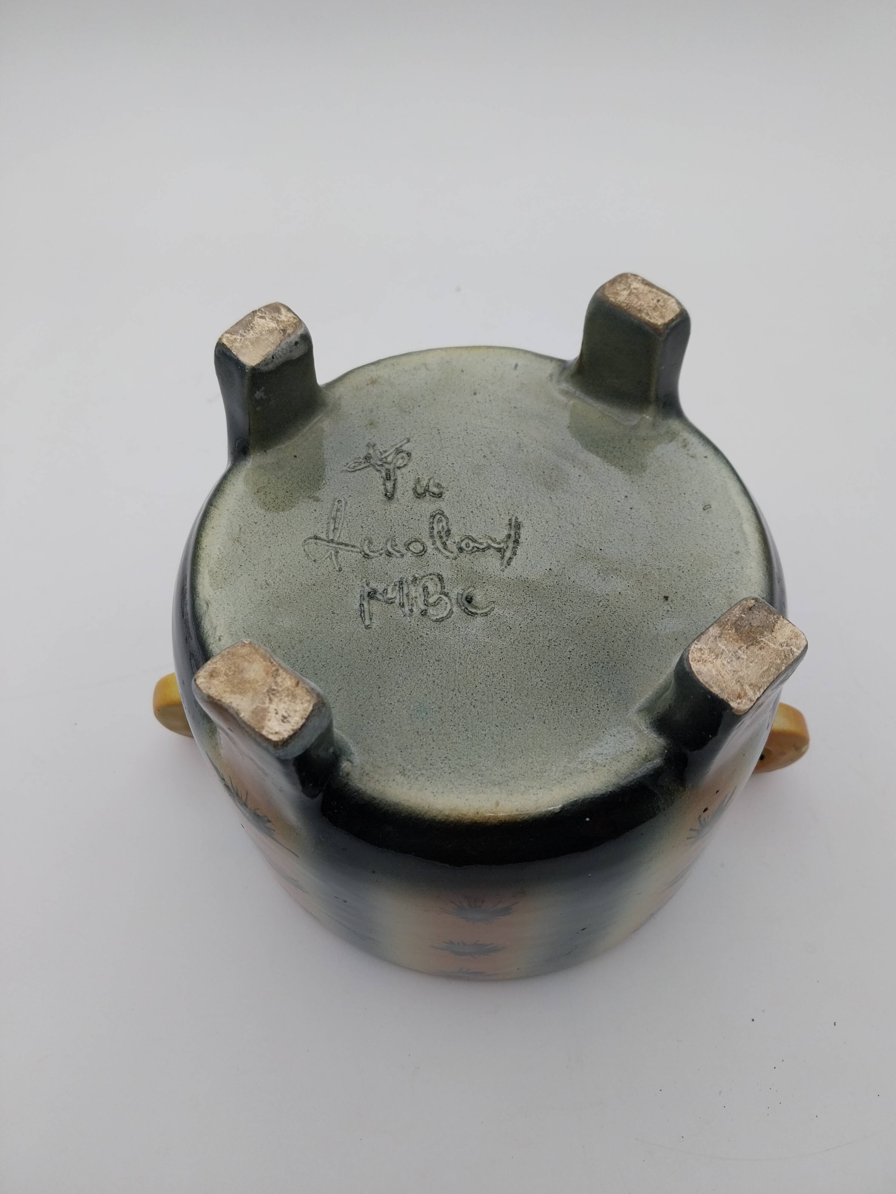Accolay signed pot cover