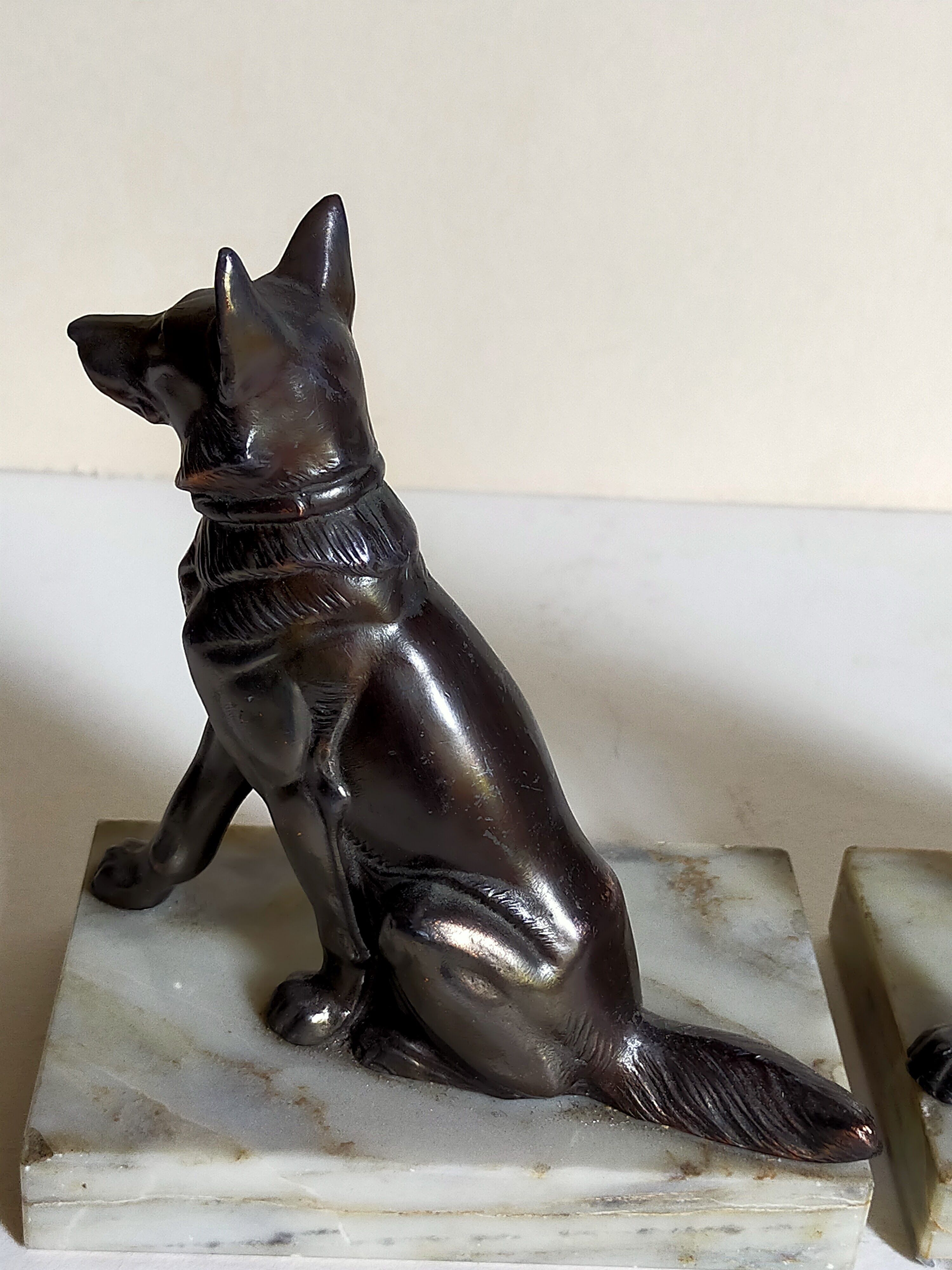 Pair of Art Deco bookends to signed wolf dogs