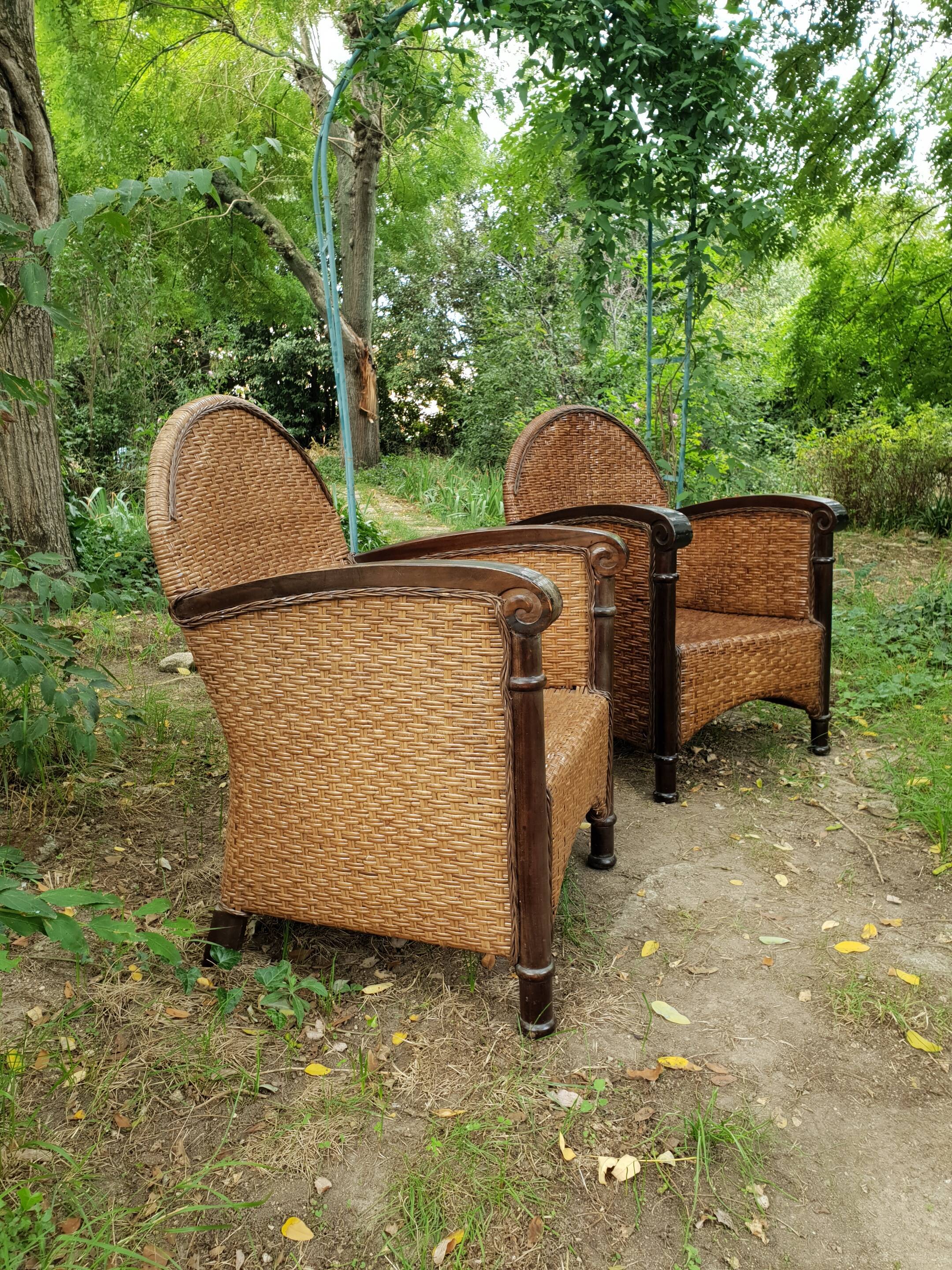 Paire de fauteuils en bois et rotin 1980