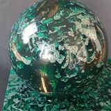 Design bookends in fractal resin with watchmaking inclusions.