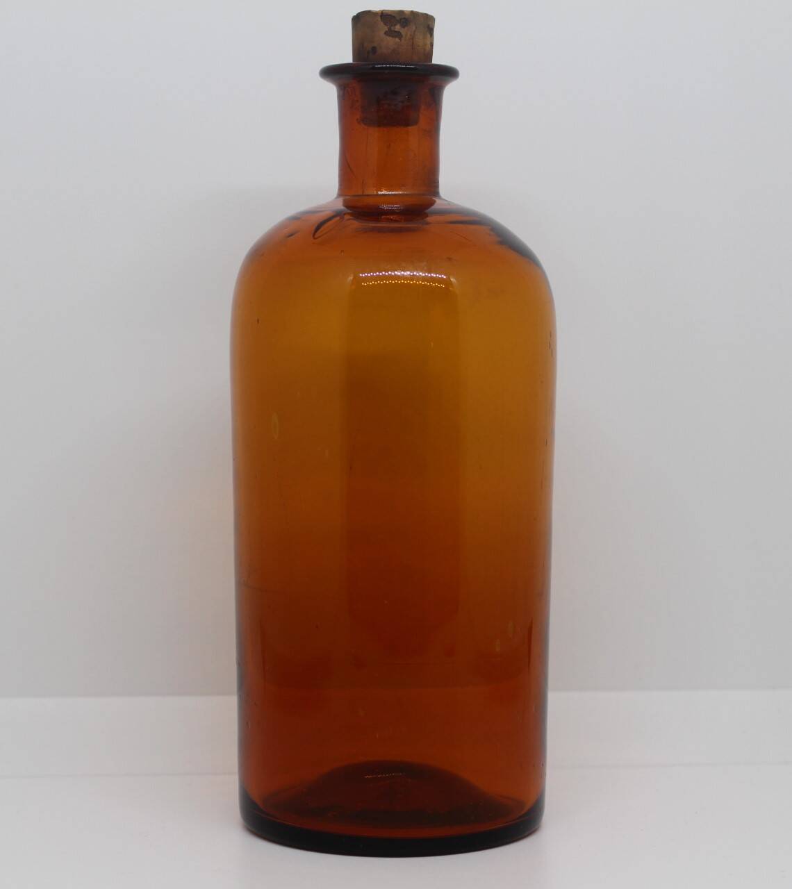 Flacon ambré en verre soufflé