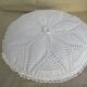 Coussin blanc vintage rond