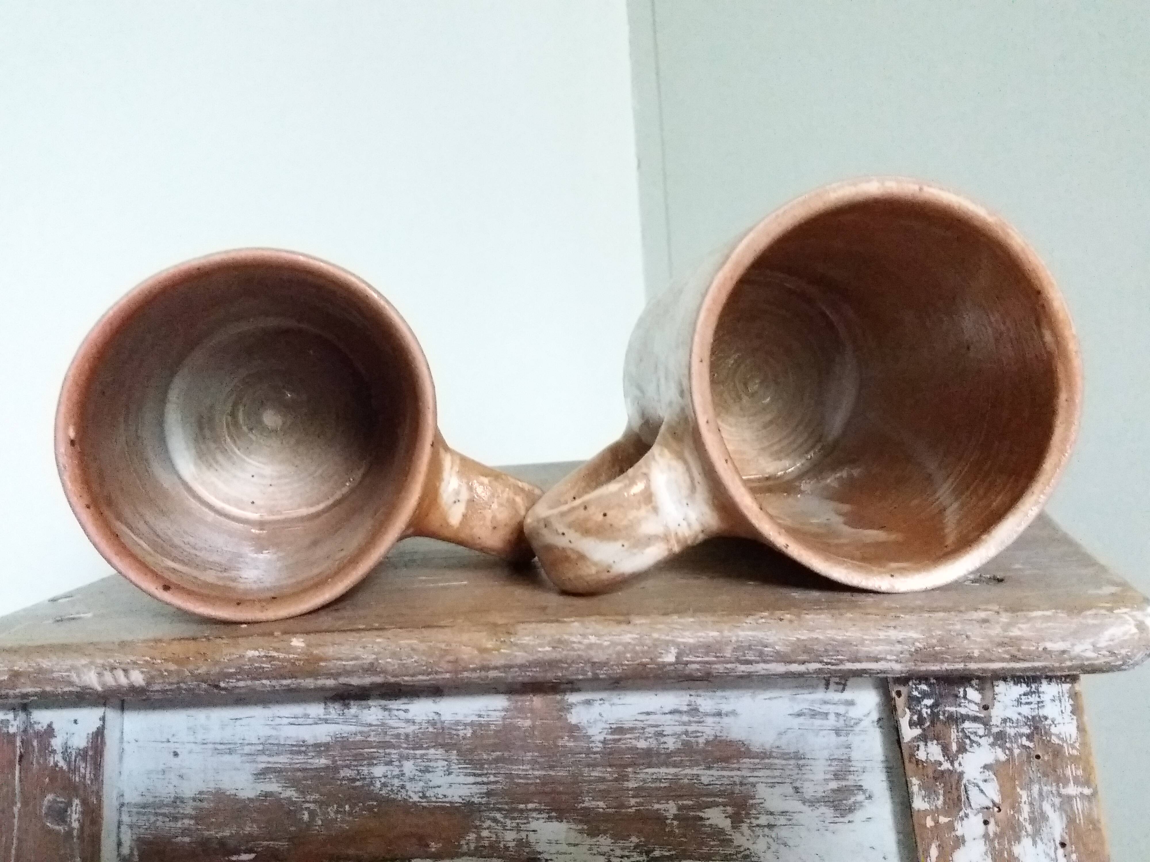 Enamelled stoneware mugs