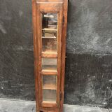 Old narrow wooden showcase.
