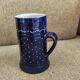 Two vintage mugs in traditional German earthenware.