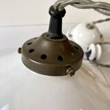 Suspension rises and falls in white glazed ceramic by The French House.