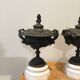 Bronze fireplace garnitures with marble base depicting leaves.