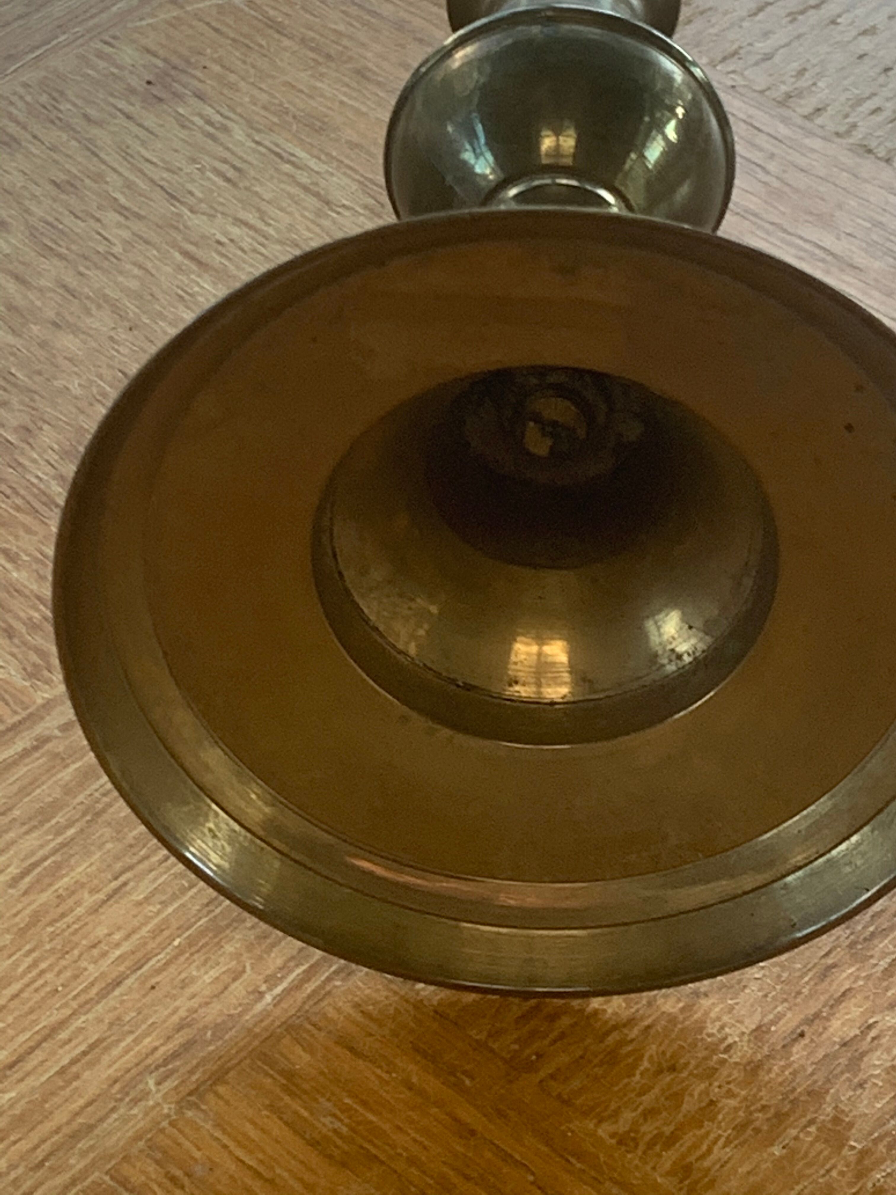 Brass candlestick, gold metal turns and chiseled original and vintage