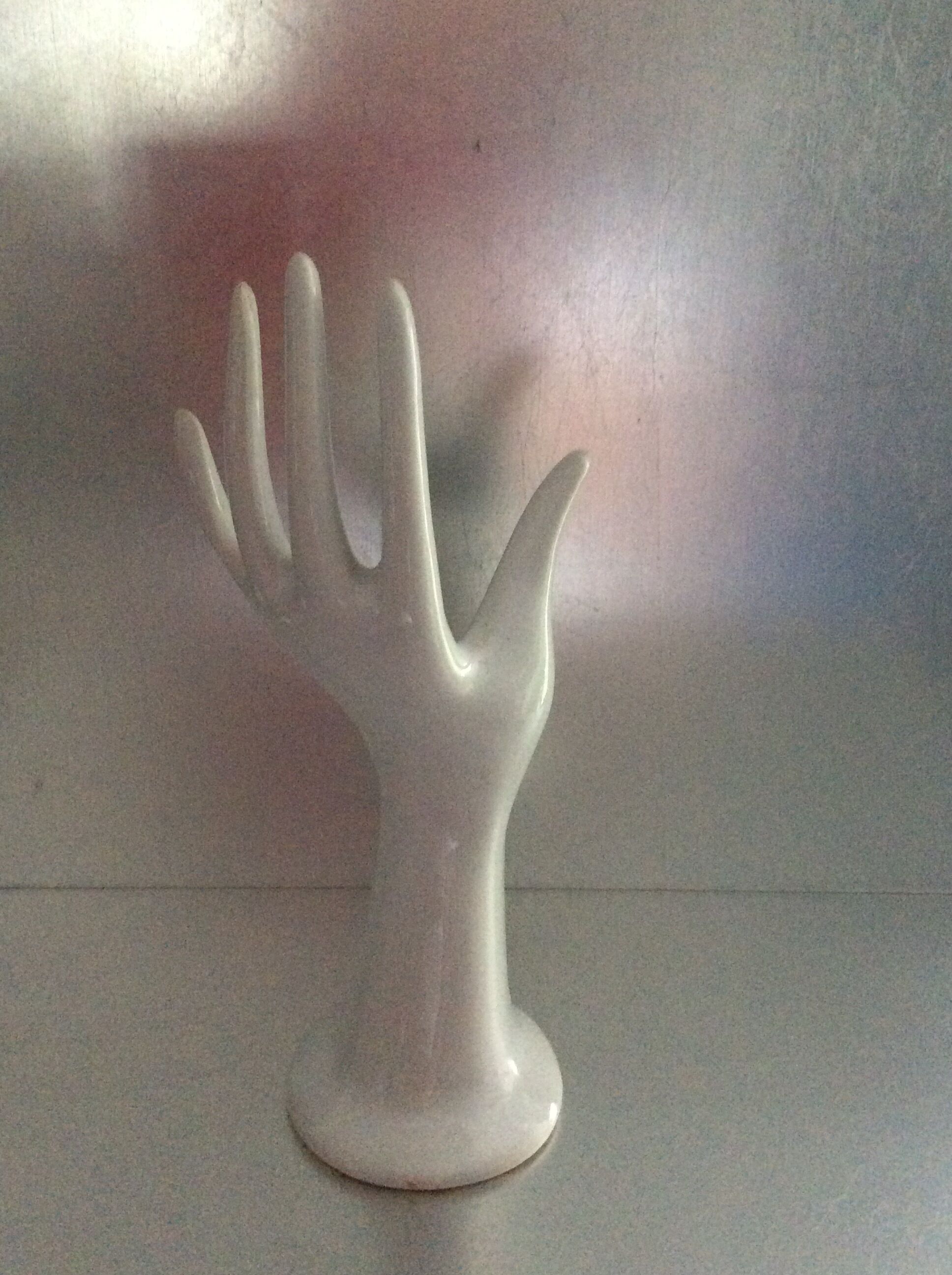 Vintage hand in white ceramic
