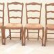 8 Straw chairs with high backs in solid wood