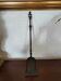 Cast iron carved fireplace shovel