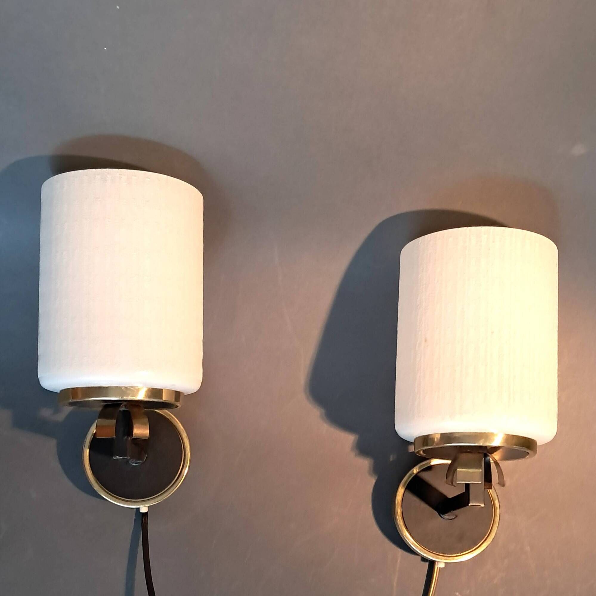 Pair of wall lights in gilded brass, black metal and opaline, 1960