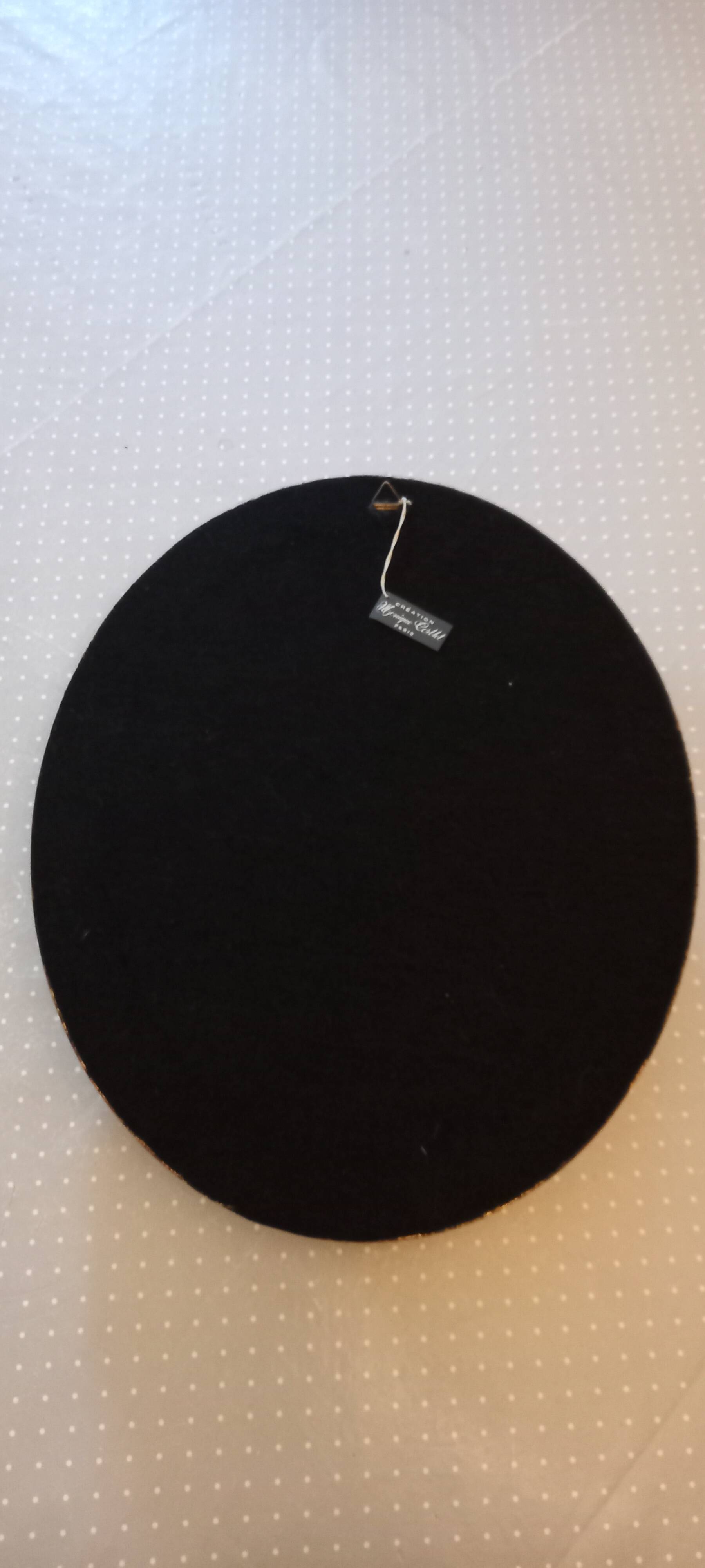 Silk flower frame under curved glass