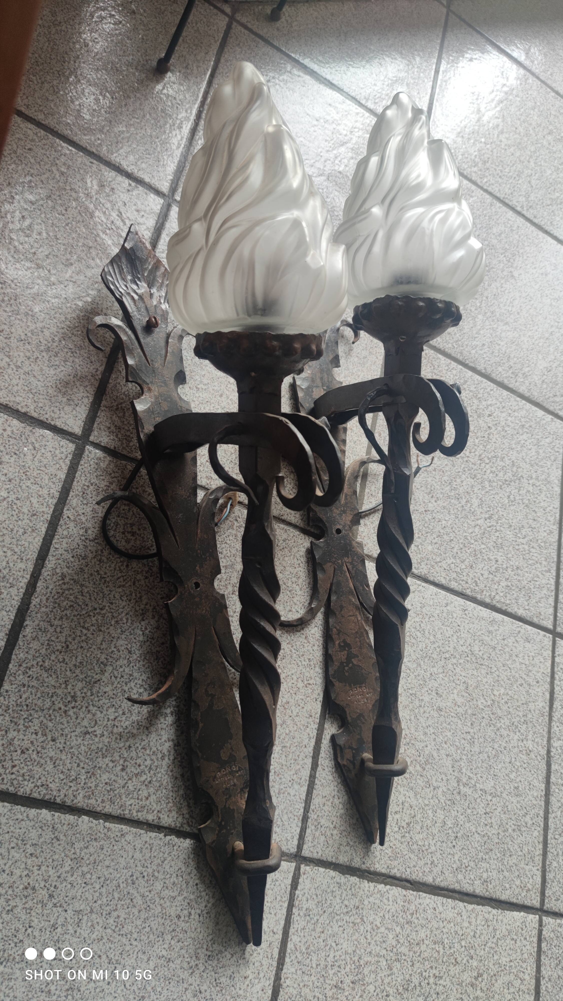 Pair of steel and glass torchieres circa 1950