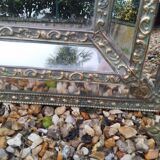 Antique mirror with copper moulding.