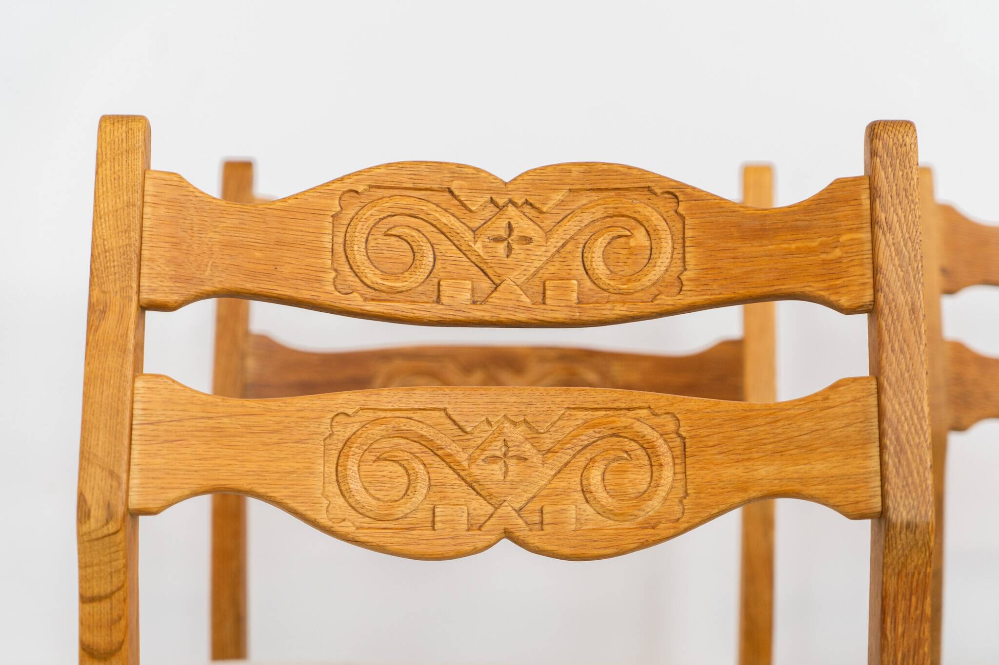 Set of 6 brutalist chairs in oak by Henning Kjaernulf
