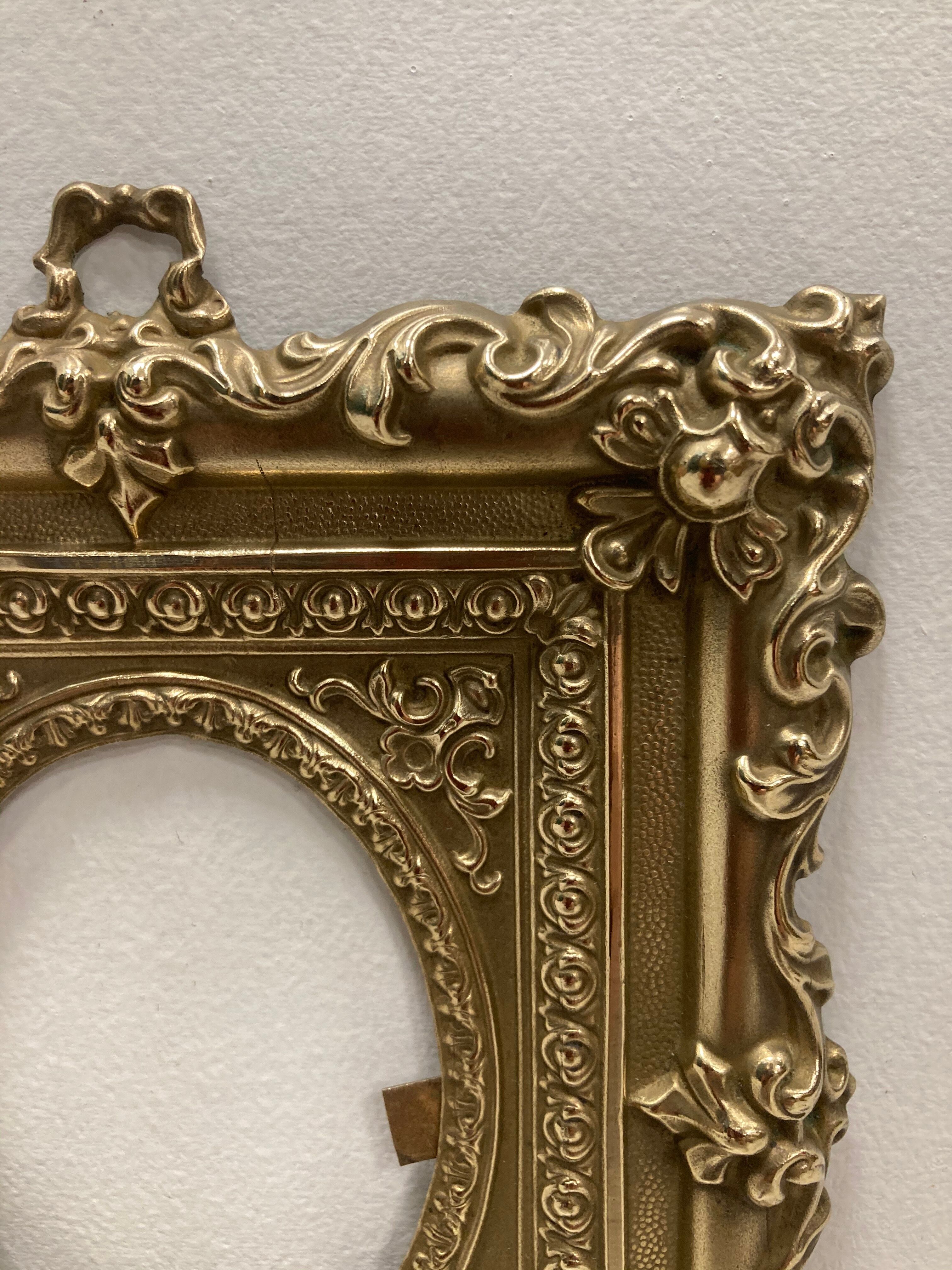 Pair of brass photo frames