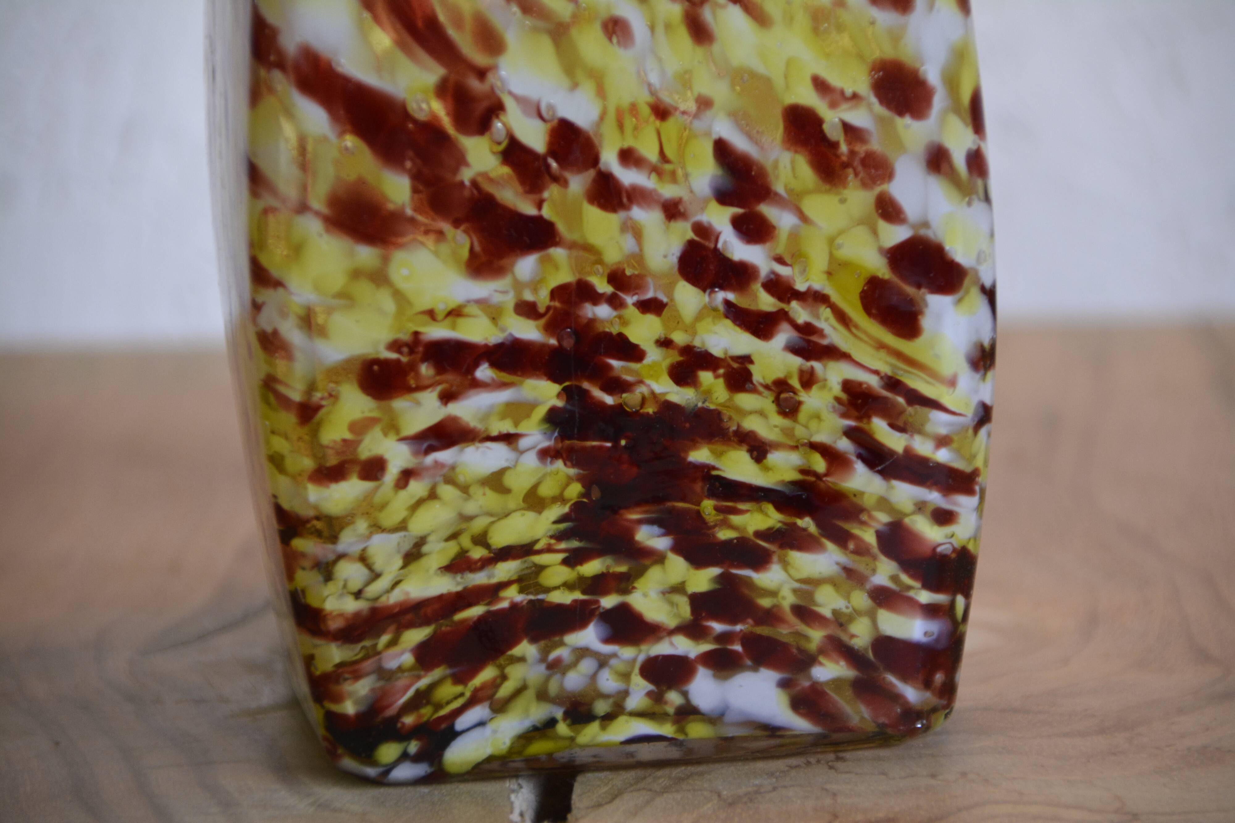 Yellow and white speckled decanter