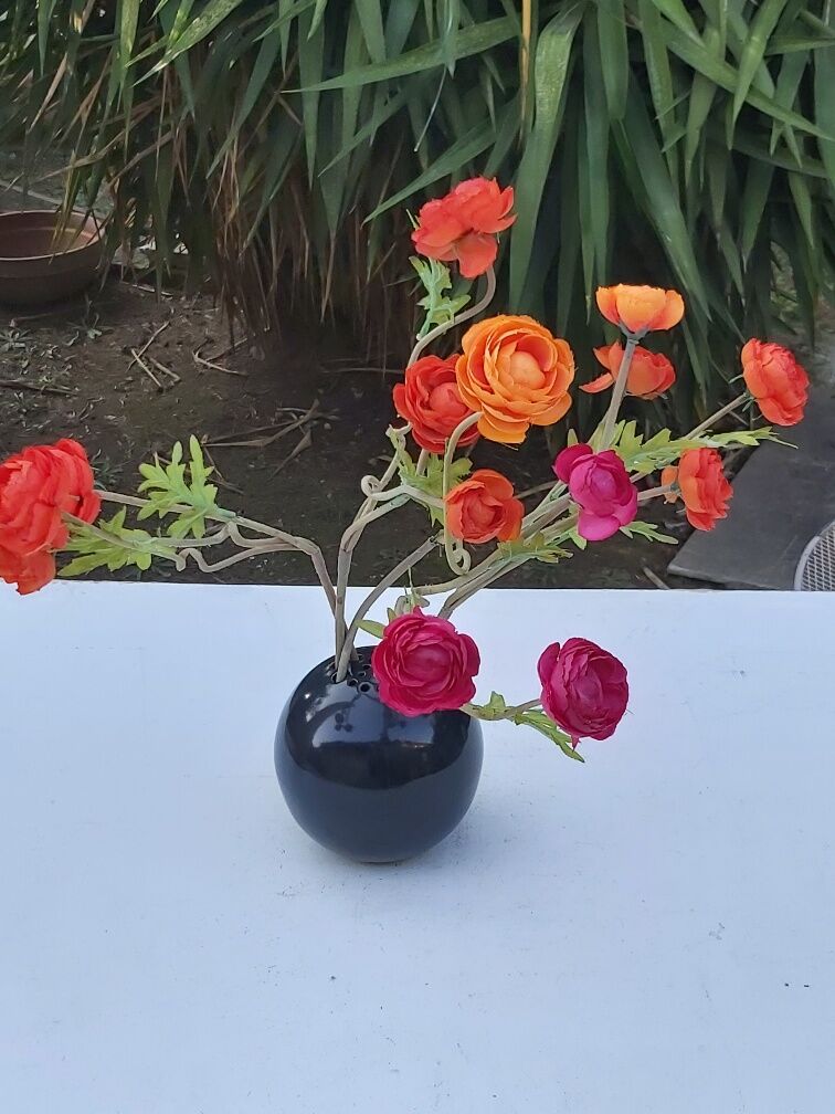 Signed ceramic flower-picker ball