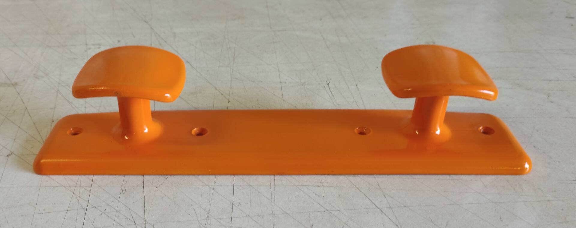 Orange plastic coat rack by Syla - 70's