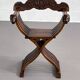 Vintage folding chair in carved wood