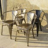 Four stackable chairs with industrial style