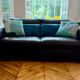 Natuzzi black leather sofa – 2-seater contemporary design
