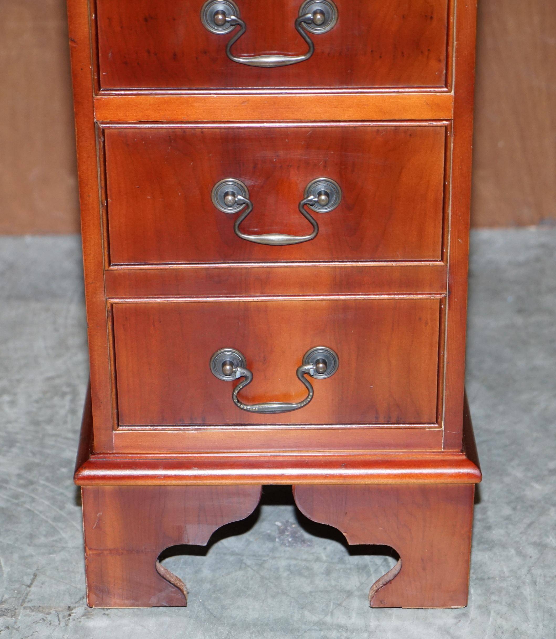 Vintage walnut desk with a leather top and two drawers.