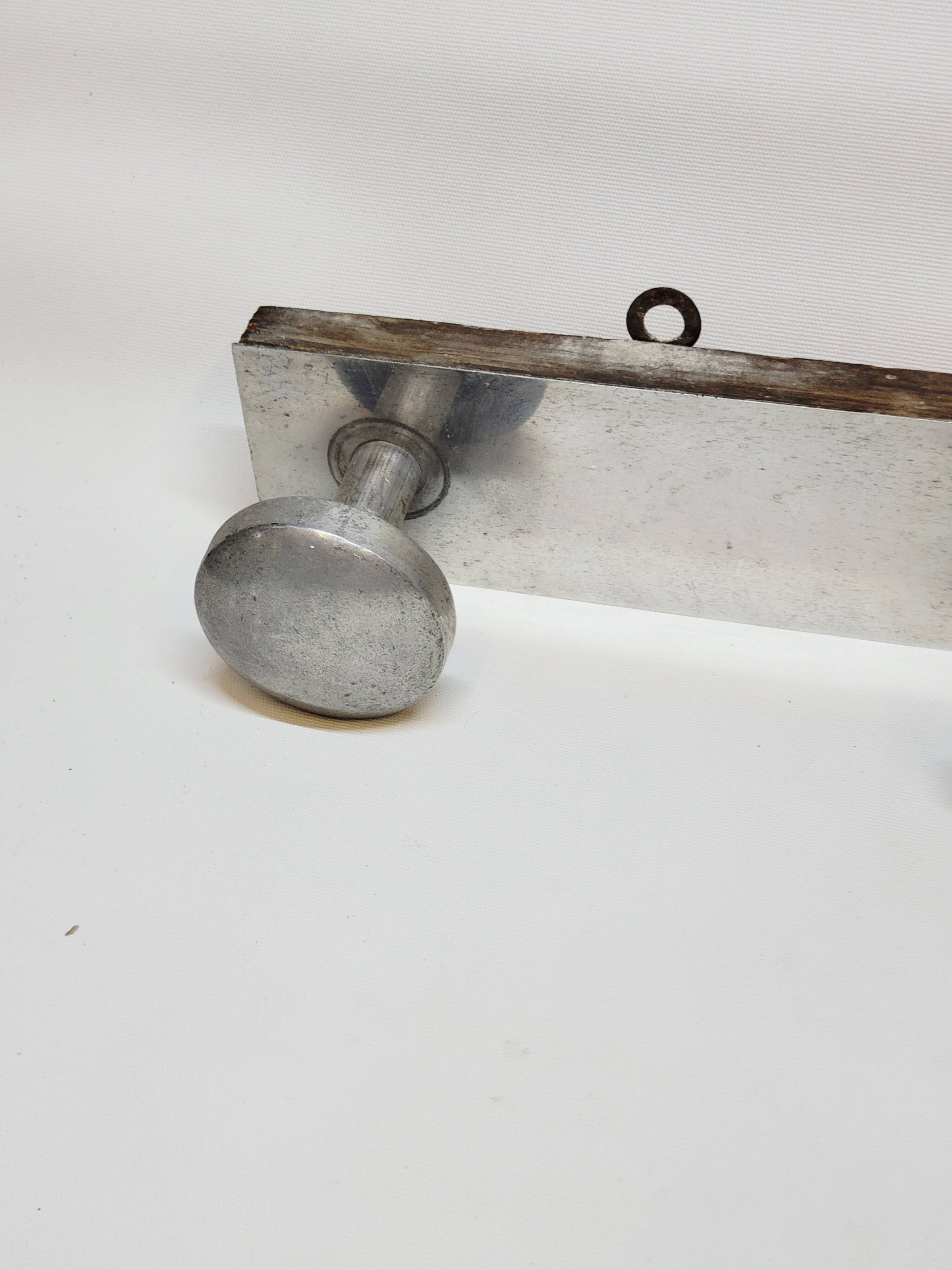 Retro vintage coat rack with 4 aluminum hooks on a wooden frame