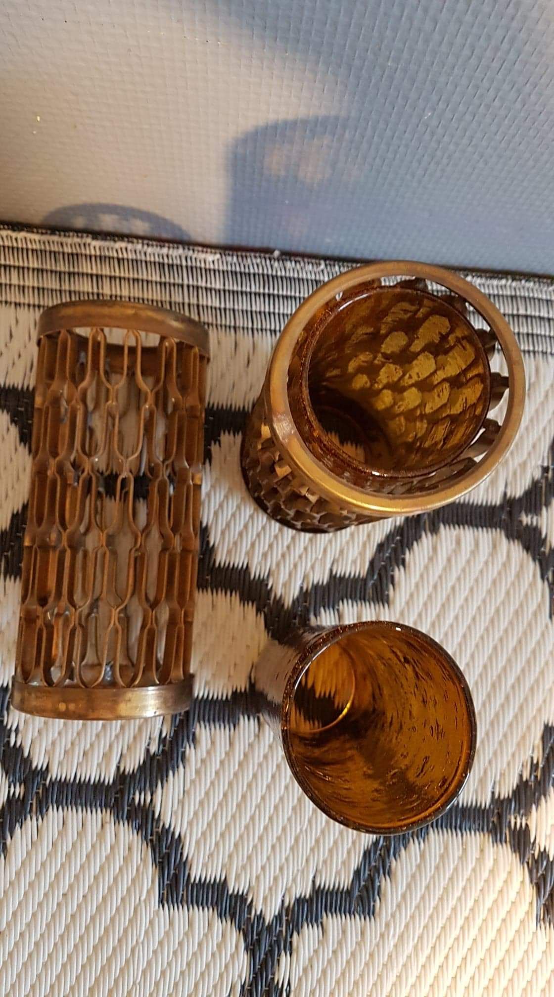 Photophores moucharabieh style candlesticks in brass and orange bubbled glass