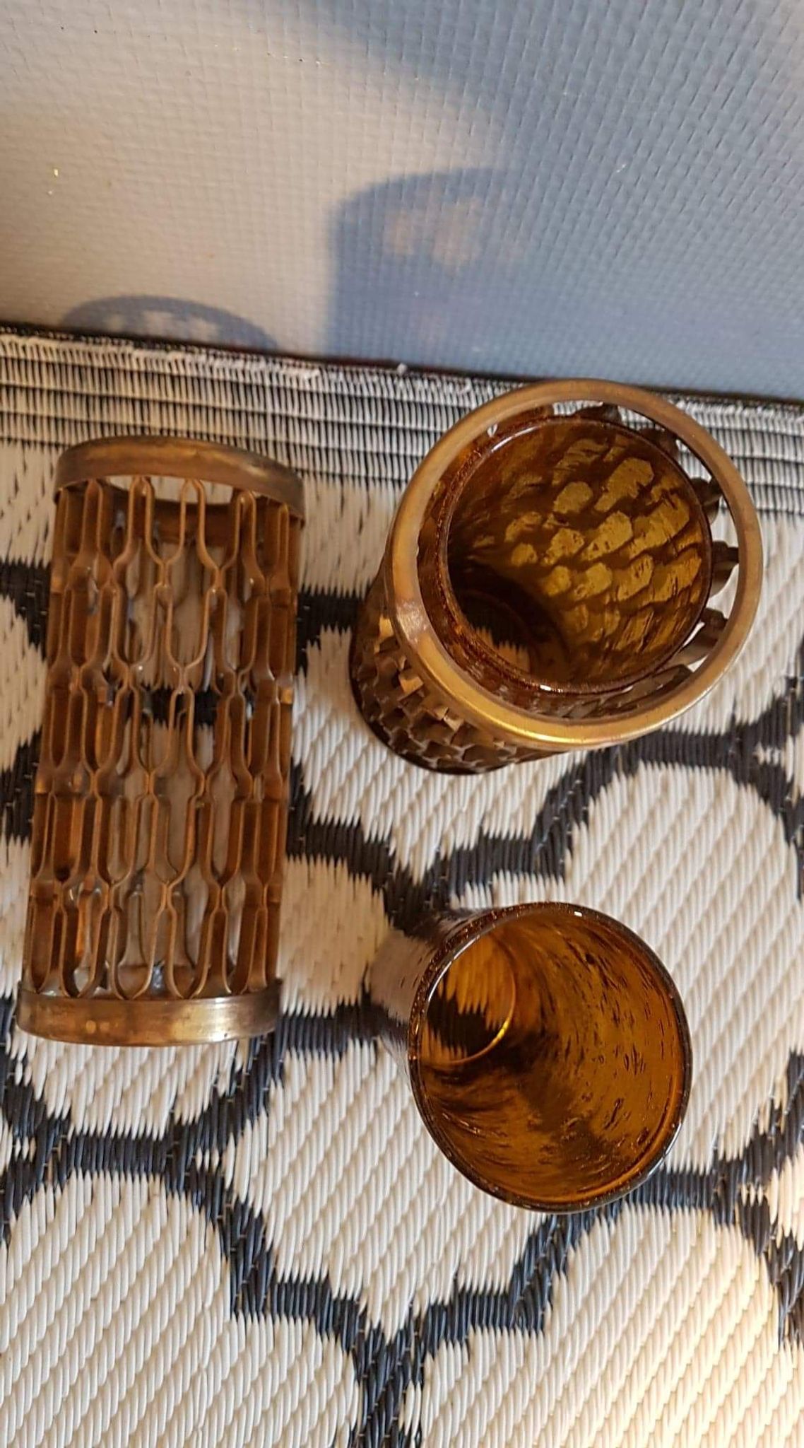 Photophores moucharabieh style candlesticks in brass and orange bubbled glass