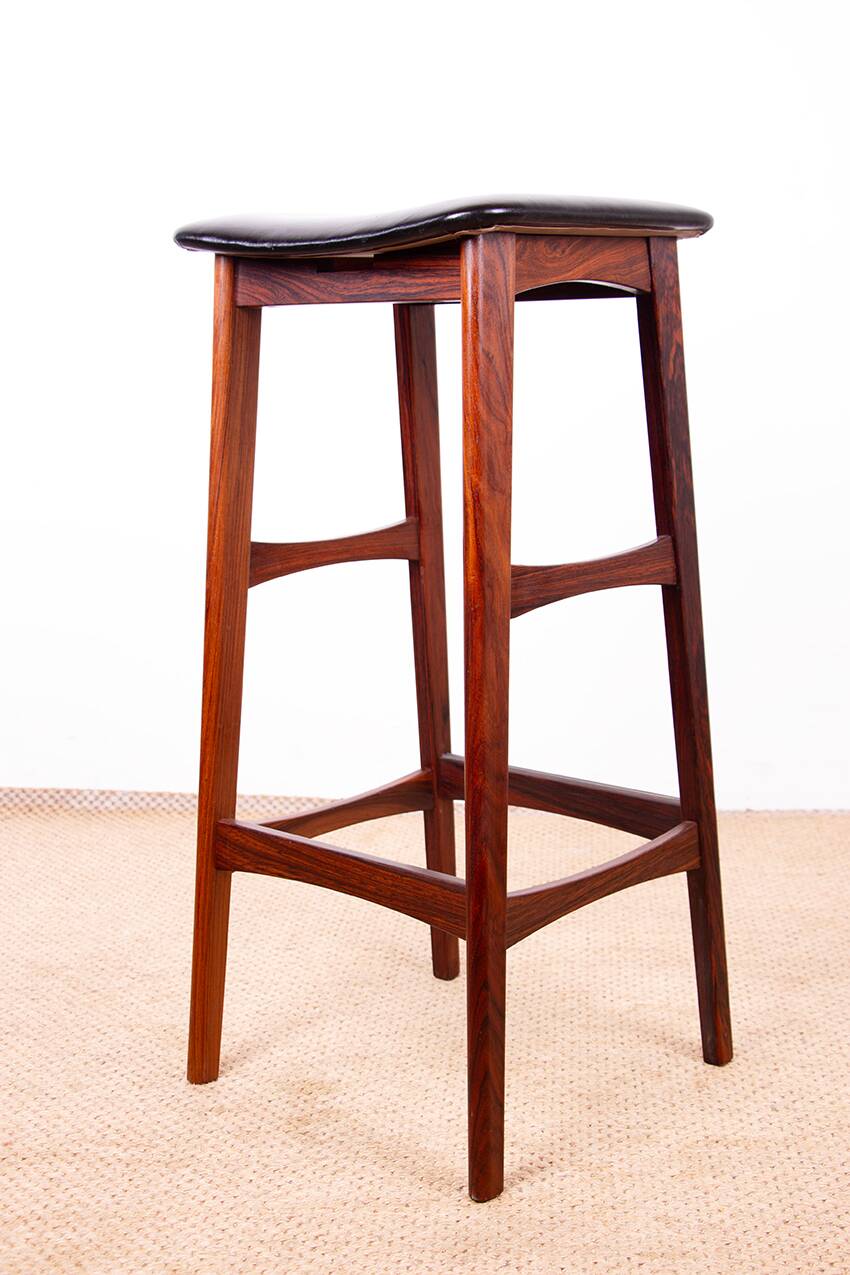 4 Danish high stools, rosewood and black leather, Knud Bent for Dyrlund.