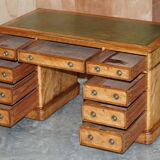 Antique desk by James Winter & Sons London in satin wood and leather.