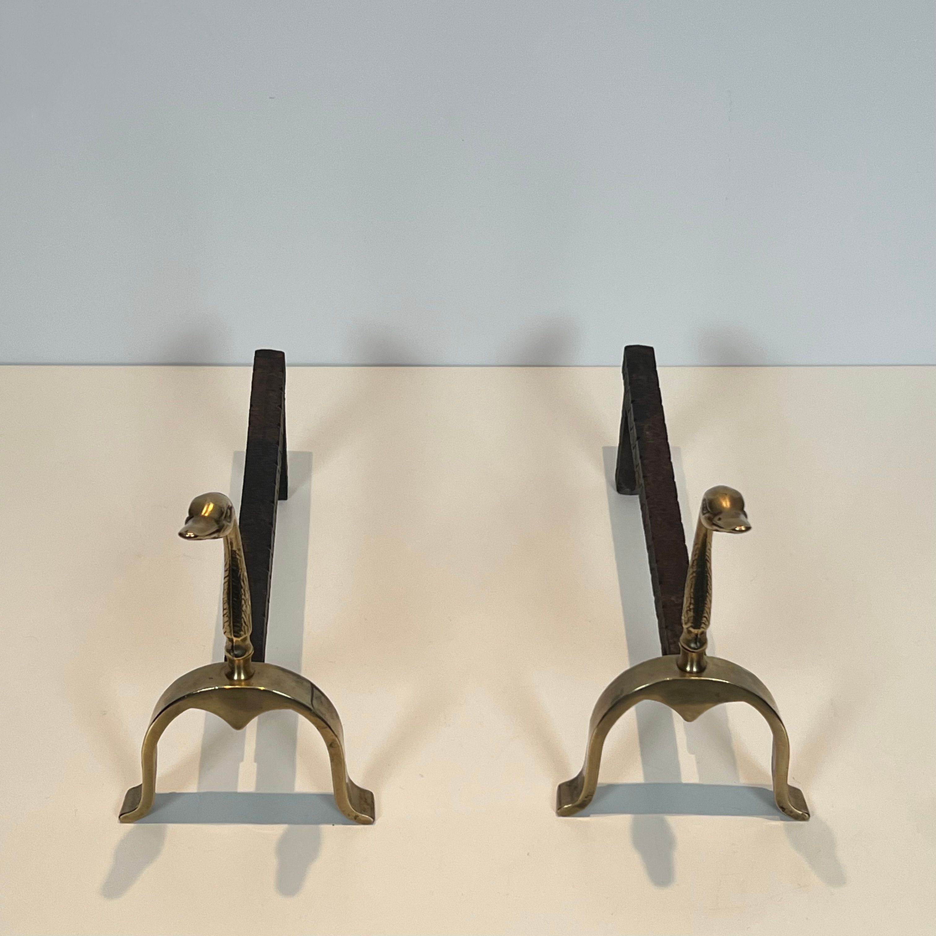 Pair of brass andirons with ducks. In the style of Maison Jansen.