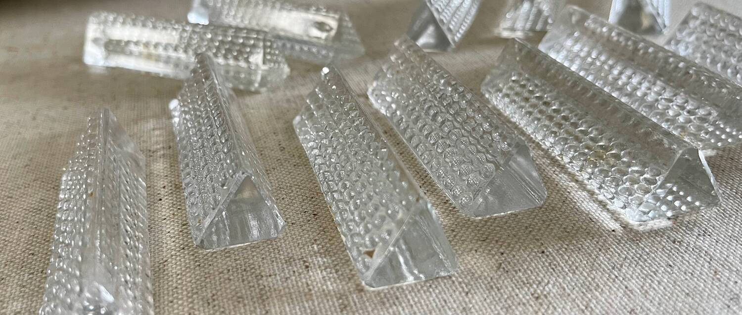 12 glass knife holders.