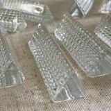 12 portes couteaux en verre.