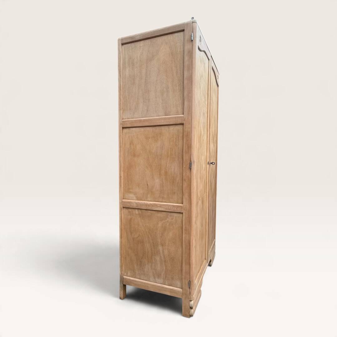 Parisian Art Deco wardrobe, renovated with raw wood.