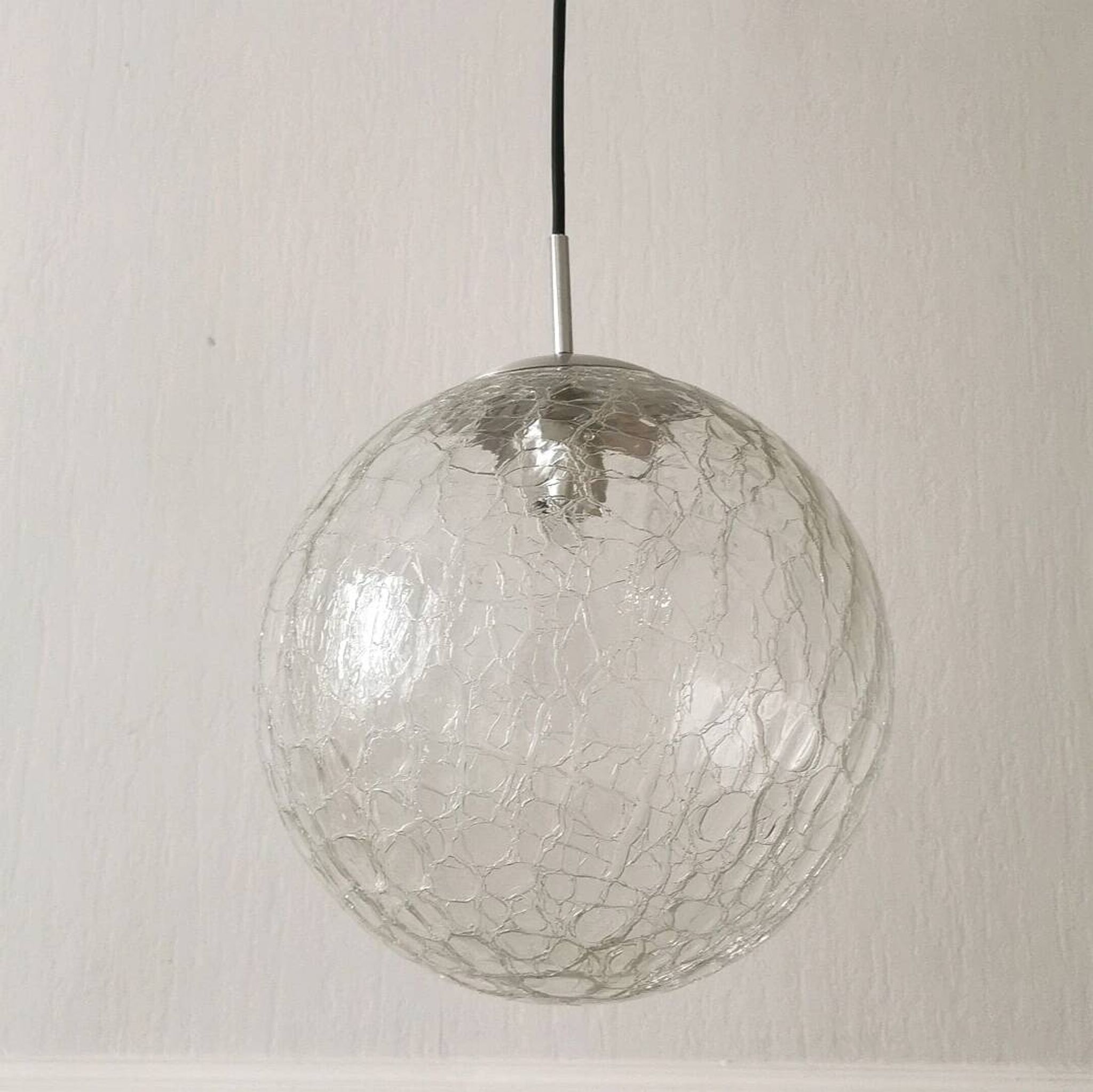 Suspension globe cracked glass Raak design, 1970