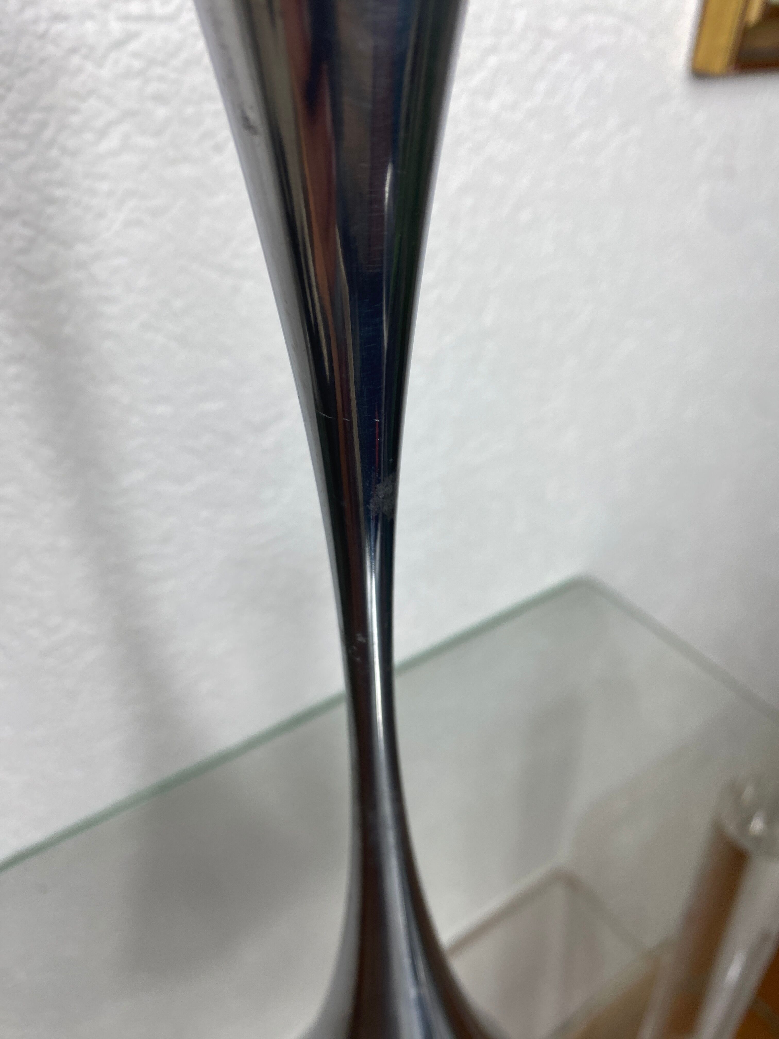 Pair of designer candle holders in stainless steel