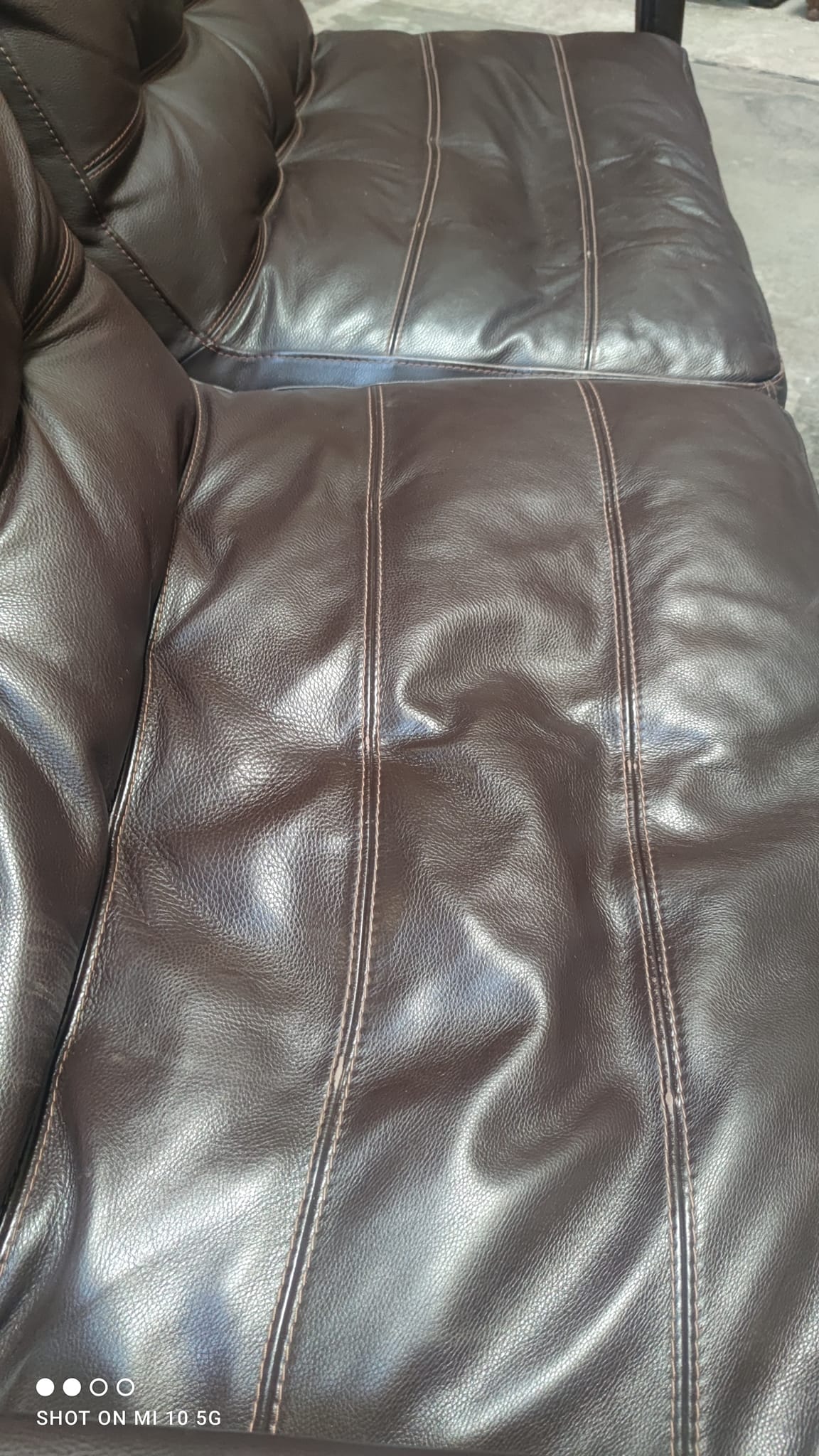 Four-seater sofa in dark brown leather from Steiner by designer Pascal Daveluy, model