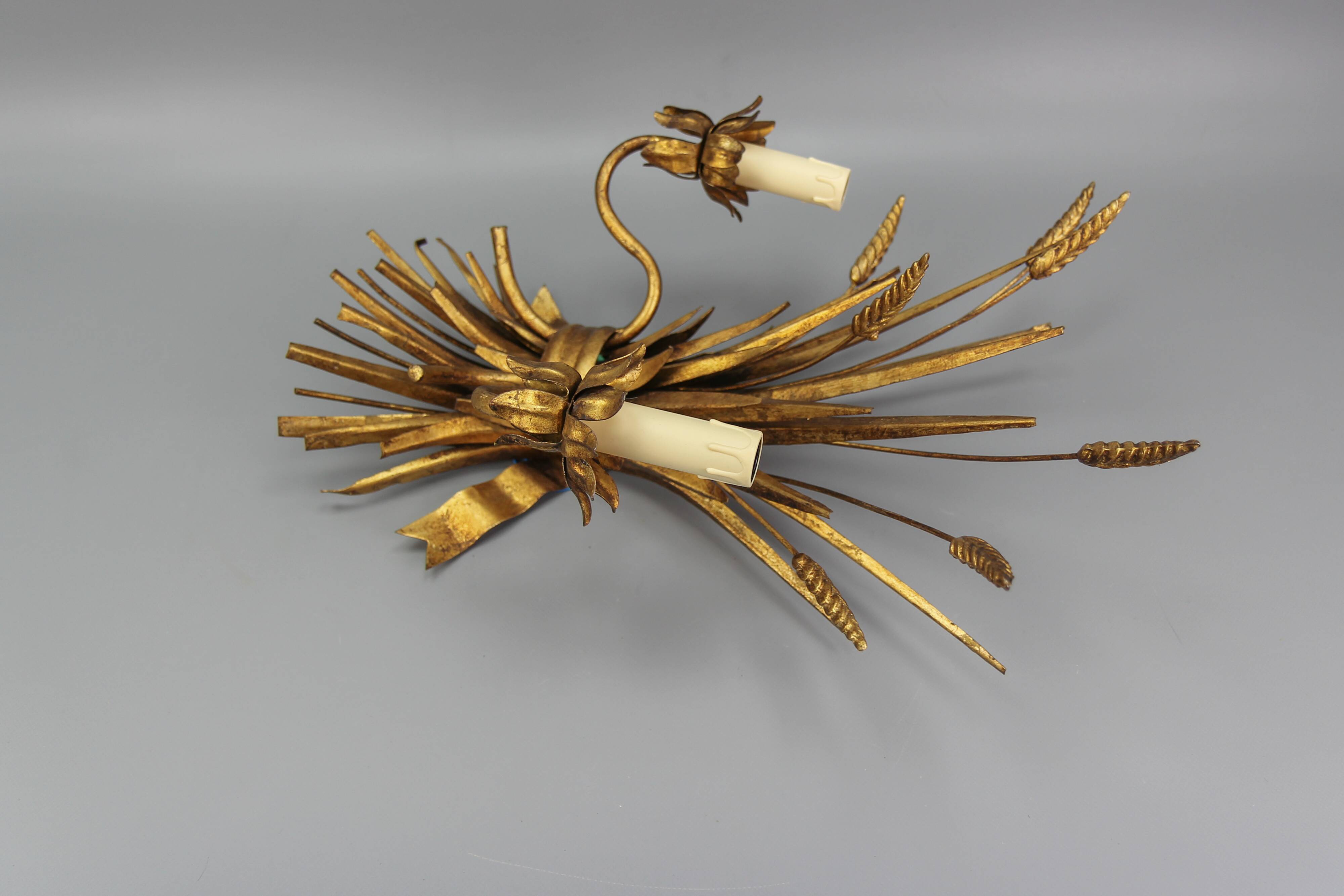 Gilt metal wheat sheaf two-light wall sconce