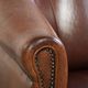 Vintage sheepskin club armchair in English style with deep colours
