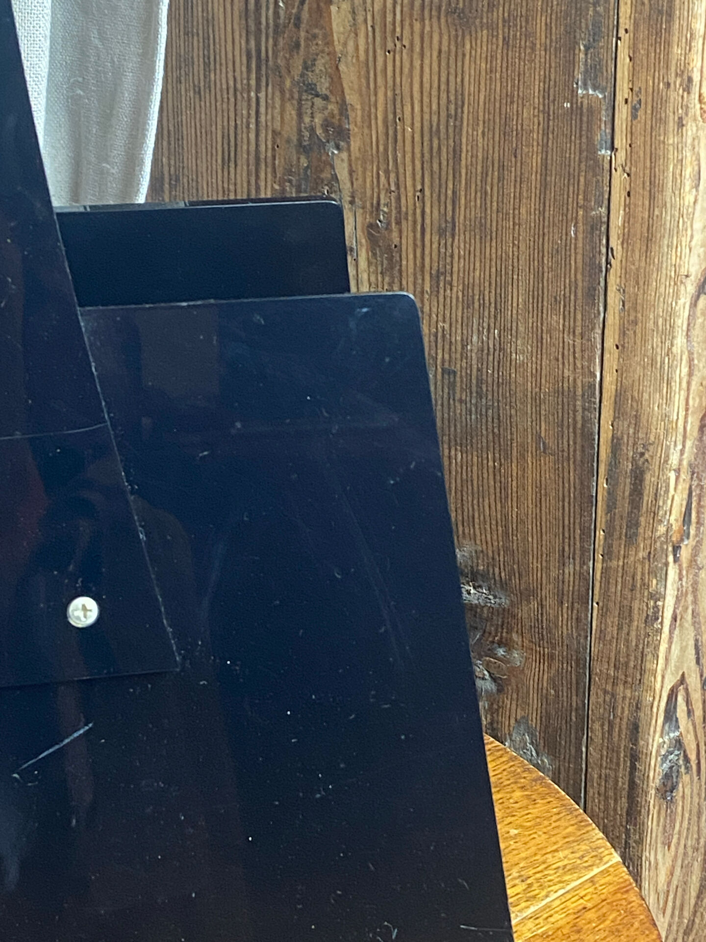 Black plexiglass magazine rack