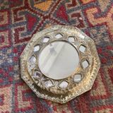Antique mirror in worked brass