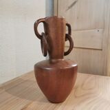 vase en bois sculpté dans la masse
