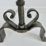Pair of ironwork andirons in the style of Raymond Subes, circa 1940